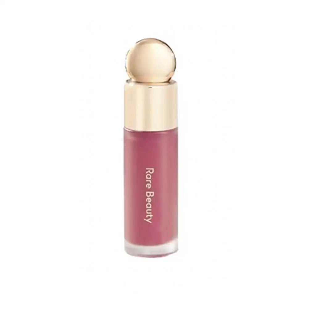 Blush Líquido Selena da Rare Beauty: Naturalmente radiante, de longa duração, com acabamento luminoso e textura leve, ideal para todos os tipos de pele.