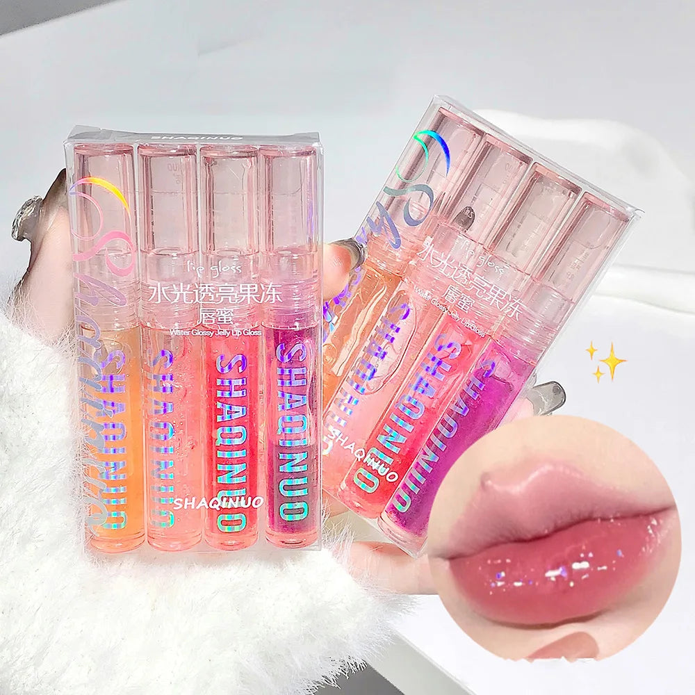 Conjunto de 4 unidades de Gloss Labial em Gel com Efeito Espelhado à Base de Água. Hidrata os lábios, possui brilho com pérolas finas e realça a cor.