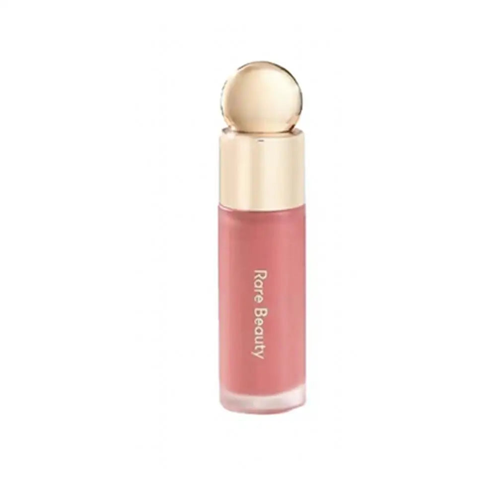 Blush Líquido Selena da Rare Beauty: Naturalmente radiante, de longa duração, com acabamento luminoso e textura leve, ideal para todos os tipos de pele.