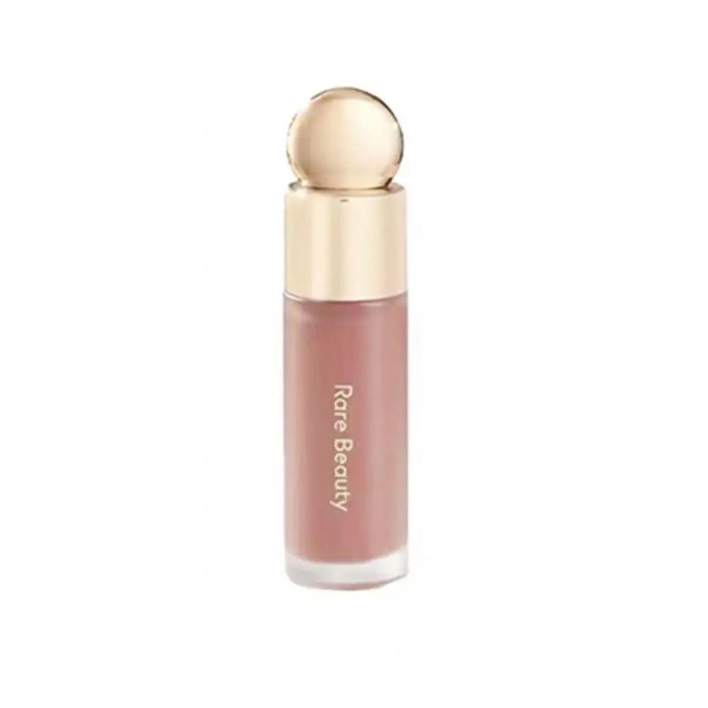 Blush Líquido Selena da Rare Beauty: Naturalmente radiante, de longa duração, com acabamento luminoso e textura leve, ideal para todos os tipos de pele.