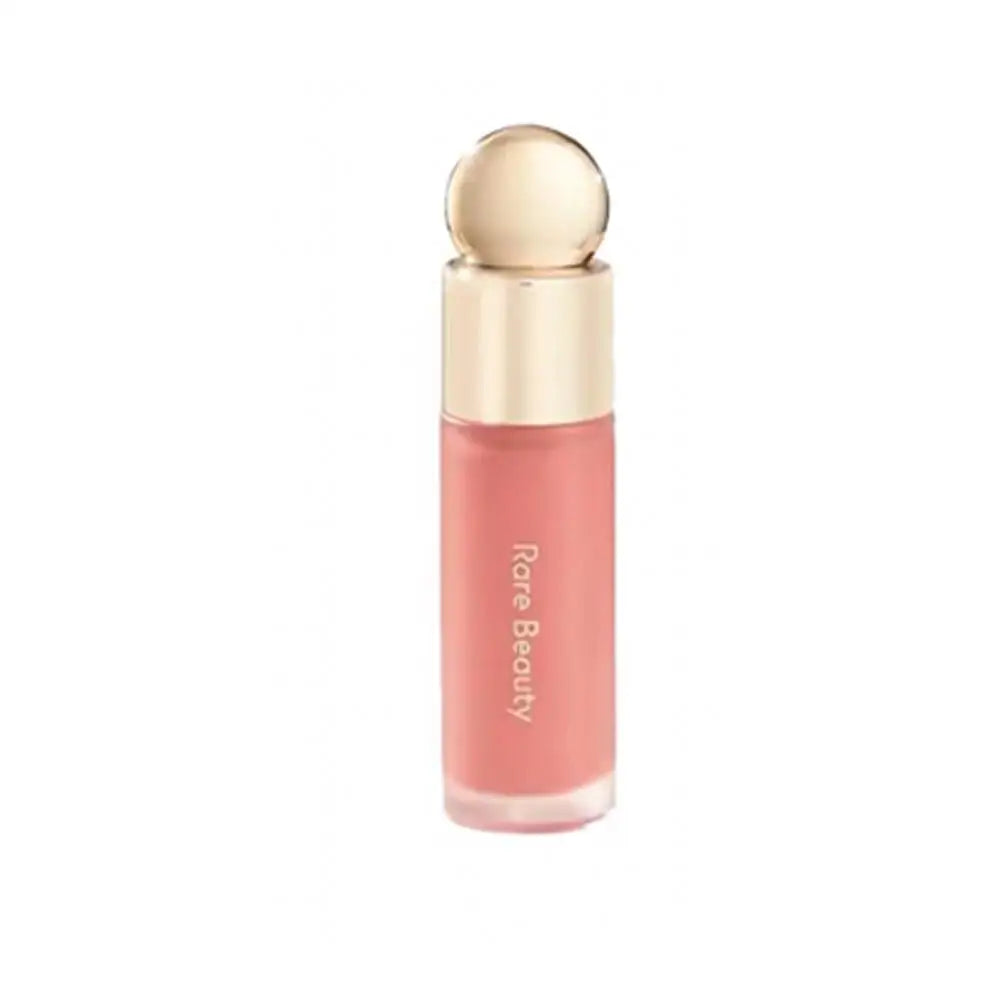Blush Líquido Selena da Rare Beauty: Naturalmente radiante, de longa duração, com acabamento luminoso e textura leve, ideal para todos os tipos de pele.
